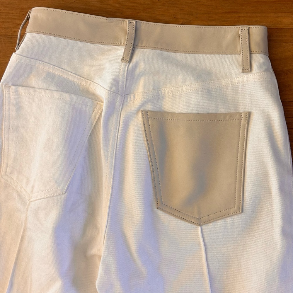 Goldsign white jeans with leather pocket and leather trim